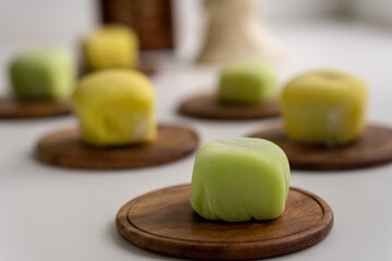 Warabimochi is a jelly-like confection made from fern starch and coated or dipped in kinako