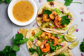 Shrimp taco with hot sauce and lime.style hugge.