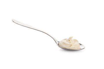 Silver spoon with tasty yogurt on white background