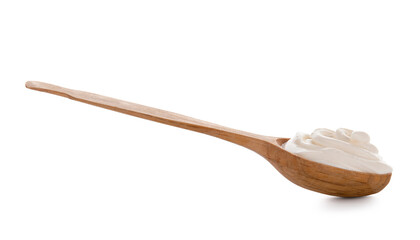 Wooden spoon with delicious yogurt on white background