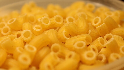 Raw macaroni close up