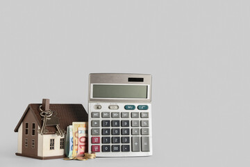 Calculator, house model, keys and money on light background. Mortgage concept - obrazy, fototapety, plakaty