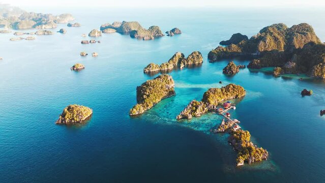 Aerial view of the West Papua's seascape. Misool region with lots of islets and tropical lagoons in Raja Ampat, Indonesia