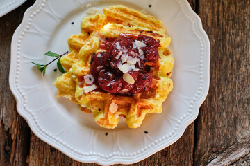 Curd waffles with strawberry sauce. Waffles with strawberry sauce. Top view.