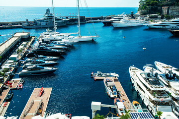 Amazing view on port Hercule of Monaco with large ocean sailboat with tall masts and large...