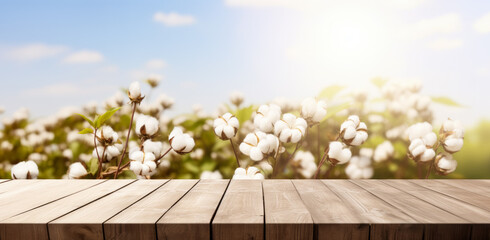 Empty rustic old wooden boards table copy space with cotton plants and white flowers in background. Product display template. Generative AI - obrazy, fototapety, plakaty