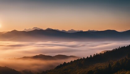 Obraz premium sunrise view over the foggy mountains 