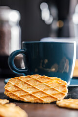 Round waffle biscuits on kitchen table.