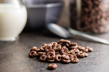 Sweet breakfast cereals on kitchen table.