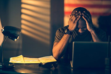 Soldier holding head missing home at military base