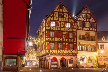Fototapeta na wymiar Traditional half-timbered houses in old town of Colmar at Christmas time, Alsace, France