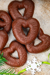 chocolate gingerbread christmas cookies heart shape, star sweet dessert holiday baking treat new year and christmas celebration meal food snack on the table copy space food background rust