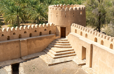 Terrace of the Jabreen Castle with the fields of date palms in background, Oman
