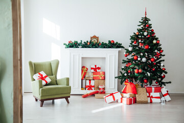 Christmas tree with gifts in the interior of the white room santa decor for the new year
