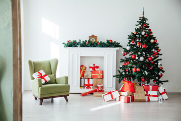 Obraz premium Christmas tree with gifts in the interior of the white room santa decor for the new year