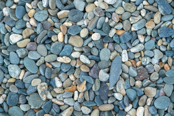 the texture of the pebbles in close-up as a background