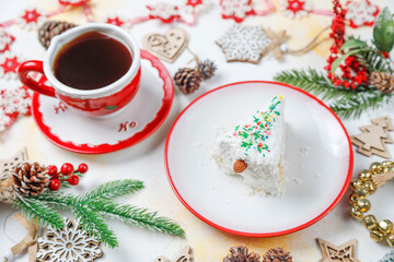 Obraz na płótnie Canvas Raffaello cake slice decoratied as a christmas tree.