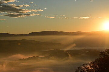 sunrise over the fog