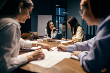 A business meeting at boardroom.