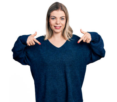 Young blonde woman wearing casual sweater looking confident with smile on face, pointing oneself with fingers proud and happy.