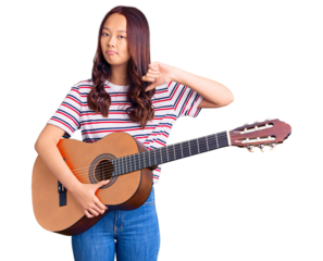 Young beautiful chinese girl playing classical guitar with angry face, negative sign showing dislike with thumbs down, rejection concept