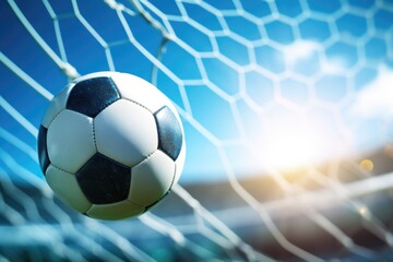 A thrilling close-up freezes the dynamic moment of a soccer ball soaring into the goal, capturing the intense action and the anticipation of victory on the sports field