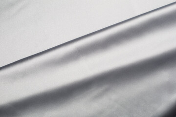 Smooth elegant grey silk or satin luxury cloth background. 