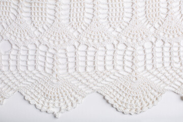 Mesh white crochet patterned background. Texture abstract background of White weaving yarn. Free space for text. white lace texture background.