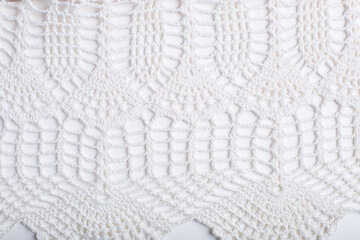 Mesh white crochet patterned background. Texture abstract background of White weaving yarn. Free space for text. white lace texture background.