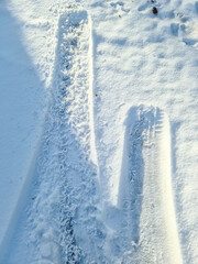 Tire Tracks on snow covered streets