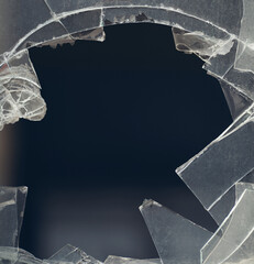 Glass hole cracks splinters. Broken Glass Window. 