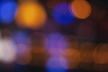 Abstract bokeh night in city background. New Year blurry walpaper. huge garland on the eve of the new year. blur of Christmas wallpaper decorations concept.holiday festival backdrop