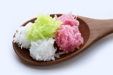 Sweet coconut balls, crispy coconut candies (Maprao Gaew). Thai traditional dessert