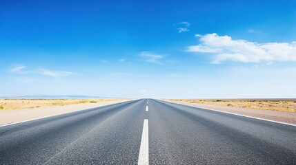 Fototapeta premium highway in the grassland background of blue sky and bright clouds, long road stretches into the distance. empty street on a beautiful sunny day