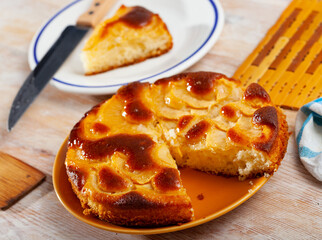 Delicious sweet tarte tatin with thinly sliced apples and caramelized crispy crust