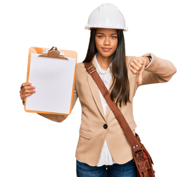 Beautiful hispanic woman architect showing black space on clipboard with angry face, negative sign showing dislike with thumbs down, rejection concept - Powered by Adobe