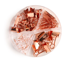 Set of rose gold paper clips, binders and pins on white background