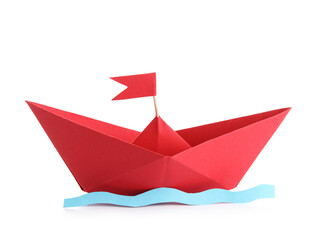 Red origami boat with flag and wave on white background