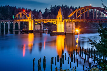 Florence Oregon Bridge Highway 101 Oregon Coast Tourist Destination Sunset Reflections on Water 2
