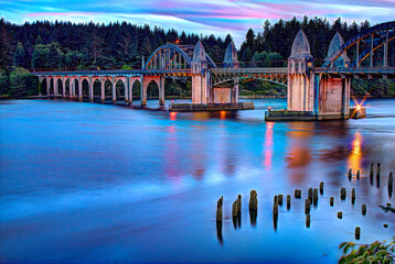 Florence Oregon Bridge Highway 101 Oregon Coast Tourist Destination Sunset Reflections on Water 1 - obrazy, fototapety, plakaty