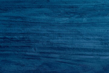 Dark blue grunge background. Toned texture of old wood. Blue vintage wooden background. Christmas background with copy space for design.