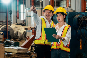 Professional quality control inspector conduct safety inspection on machinery and manufacturing...