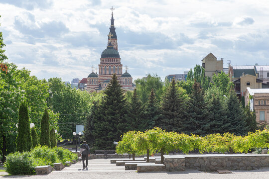 Basilica of the Annunciation cathedral seen beyond the natural park in kharkiv city