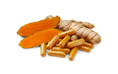 Aromatic turmeric roots and pills isolated on white