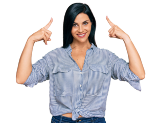 Young caucasian woman wearing casual clothes smiling pointing to head with both hands finger, great idea or thought, good memory