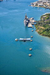 Aerial view of the USS Arizona war memorial with the USS Missouri battleship at Pearl Harbor in...