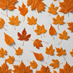 fbackground with orange fall leaves on a light surface, postcard, space for writing