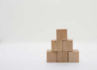 plain wood cube on white background