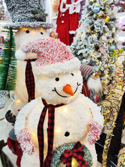 snowman with Christmas golden decoration