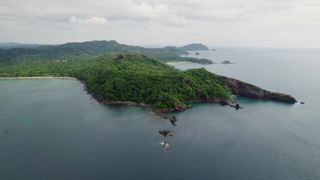 A 4K drone shot of Punta Sabana Point and the Mirador Conchal Peninsula next to Puerto Viejo and Playa Conchal, or &ldquo;Shell Beach&rdquo;, along the north-western coast of Costa Rica.